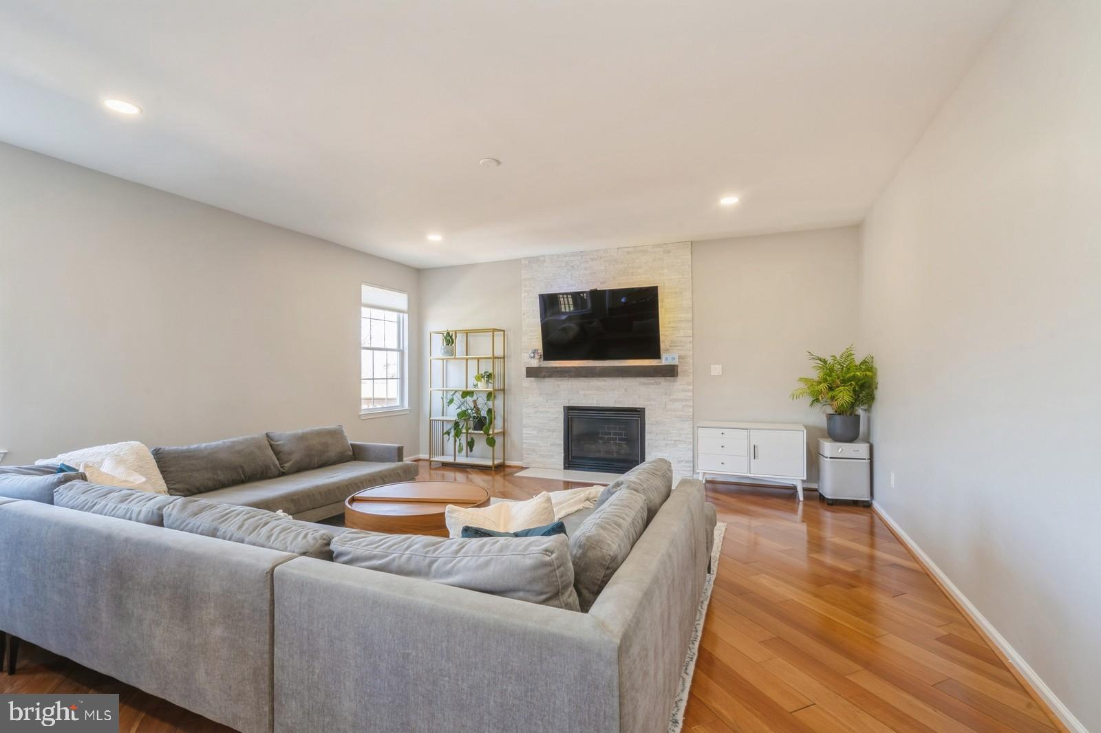 32 Moorsgate Circle Hightstown, NJ 08520 - Photo 16 of 49 a living room with furniture and a fireplace