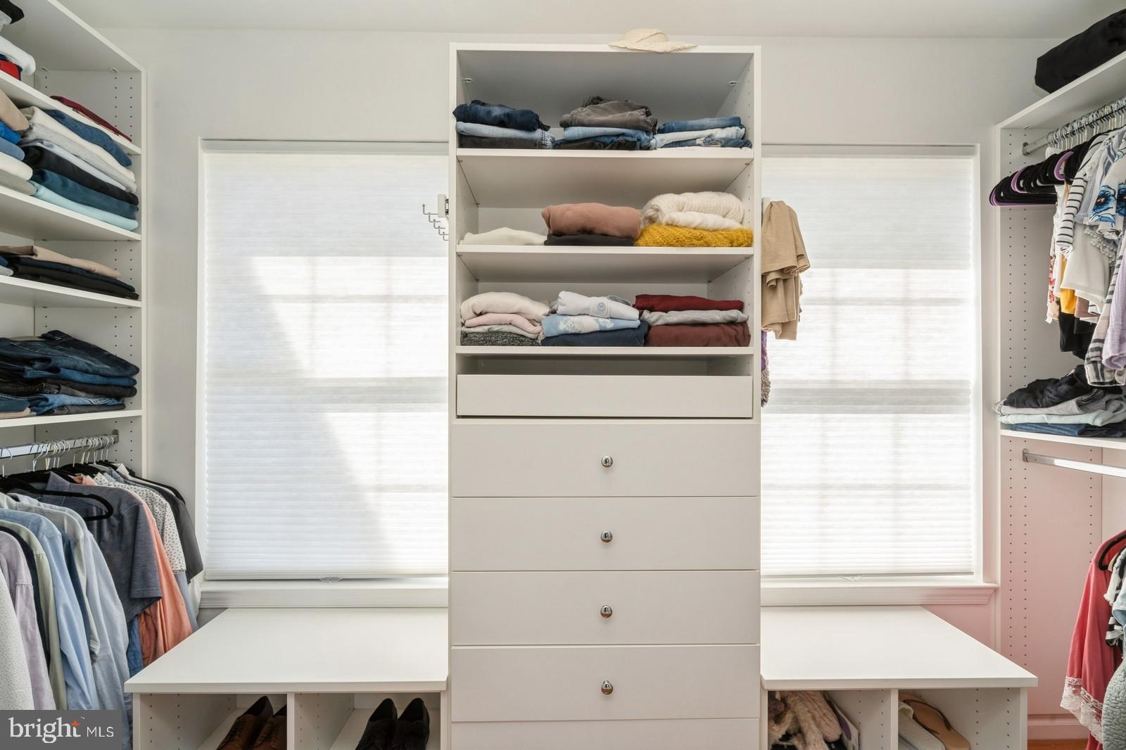 32 Moorsgate Circle Hightstown, NJ 08520 - Photo 29 of 49 a view of walk in closet with clothes and shoes