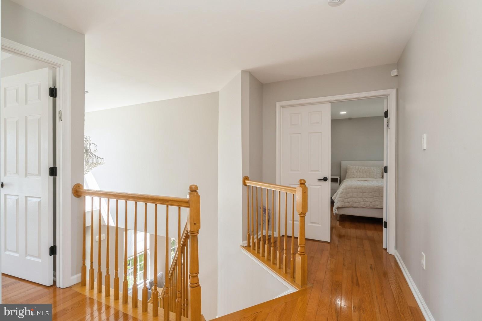 32 Moorsgate Circle Hightstown, NJ 08520 - Photo 35 of 49 a bedroom with furniture and wooden floor