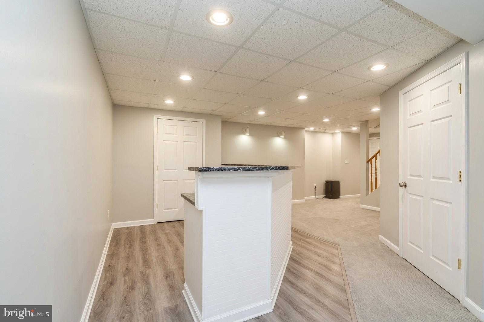 32 Moorsgate Circle Hightstown, NJ 08520 - Photo 39 of 49 a view of a hallway with a kitchen