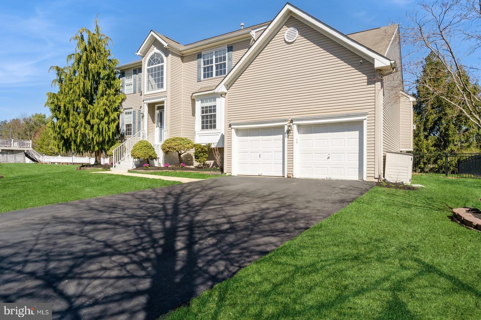 32 Moorsgate Circle Hightstown, NJ 08520 - Photo 4 of 49 a view of a house with a yard