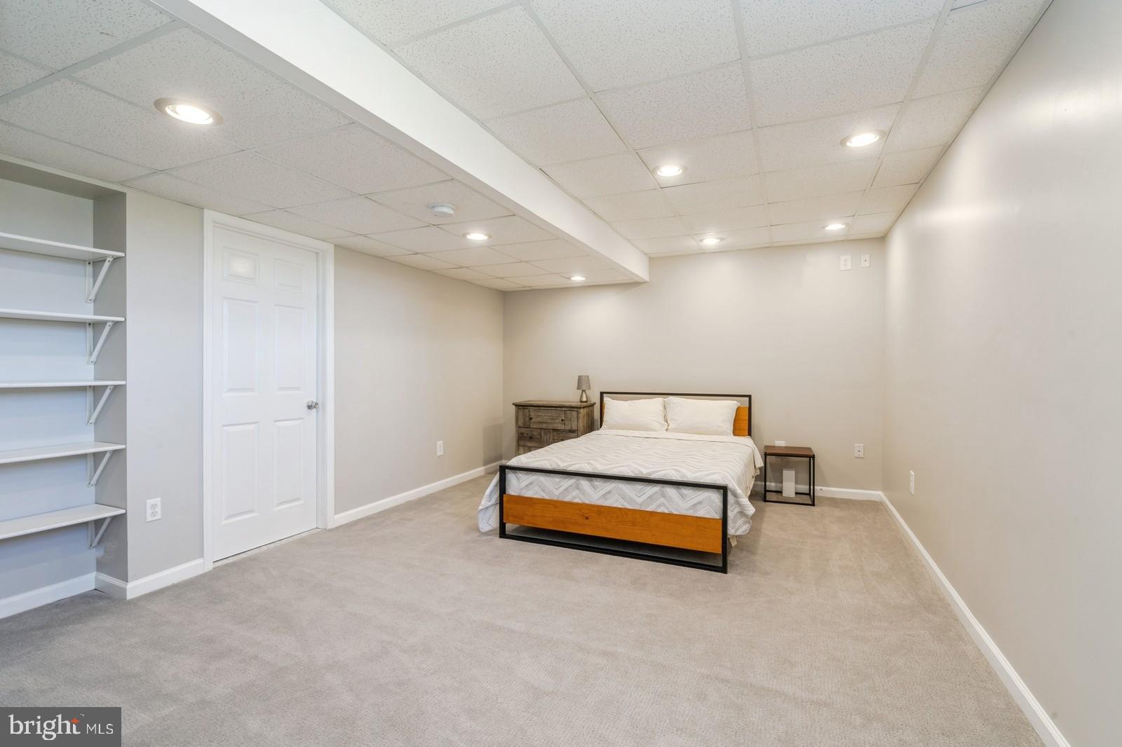 32 Moorsgate Circle Hightstown, NJ 08520 - Photo 42 of 49 a spacious bedroom with a bed and a cabinets