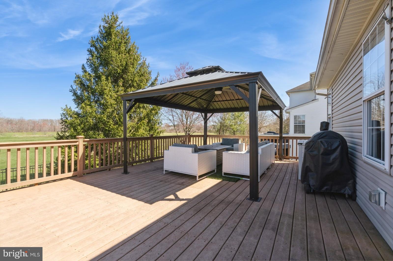 32 Moorsgate Circle Hightstown, NJ 08520 - Photo 44 of 49 a view of balcony with furniture and wooden deck