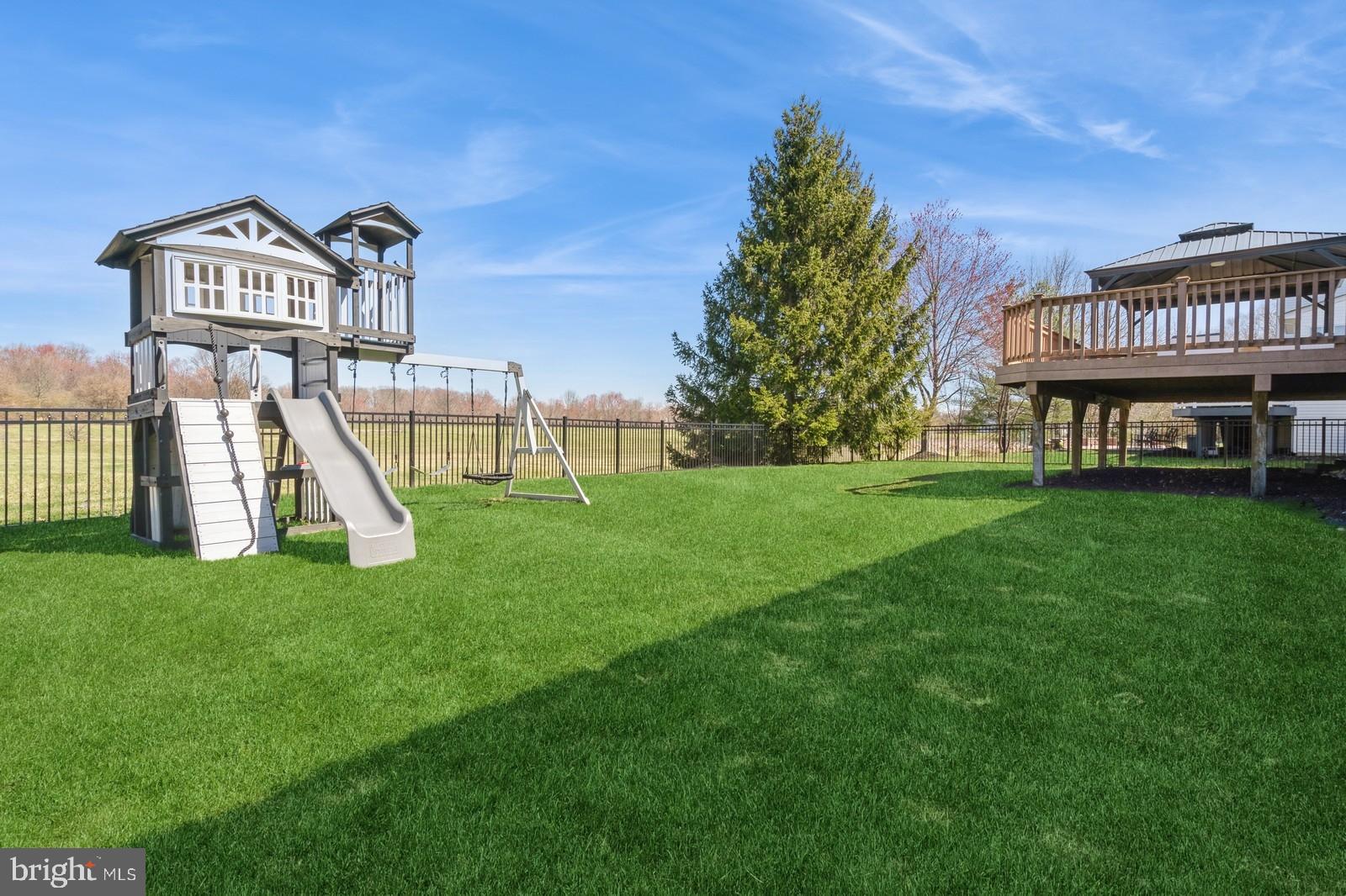 32 Moorsgate Circle Hightstown, NJ 08520 - Photo 47 of 49 a view of a house with a yard