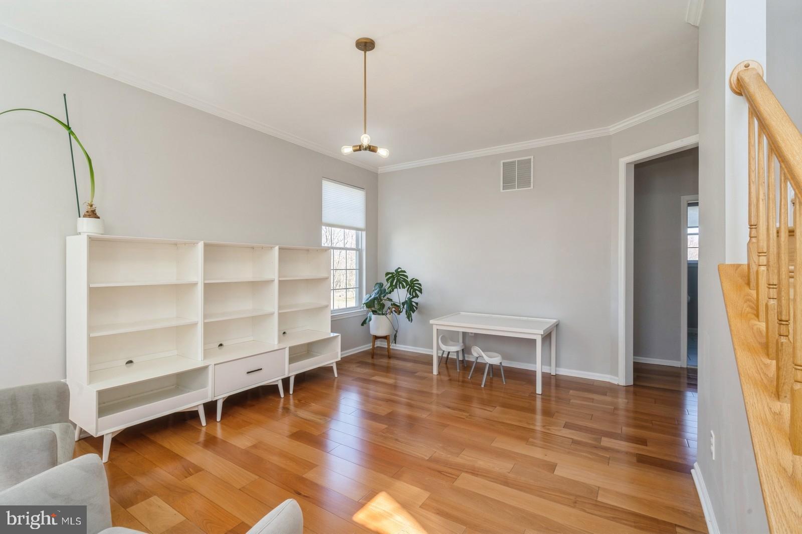 32 Moorsgate Circle Hightstown, NJ 08520 - Photo 7 of 49 a view of a livingroom with furniture and hardwood floor