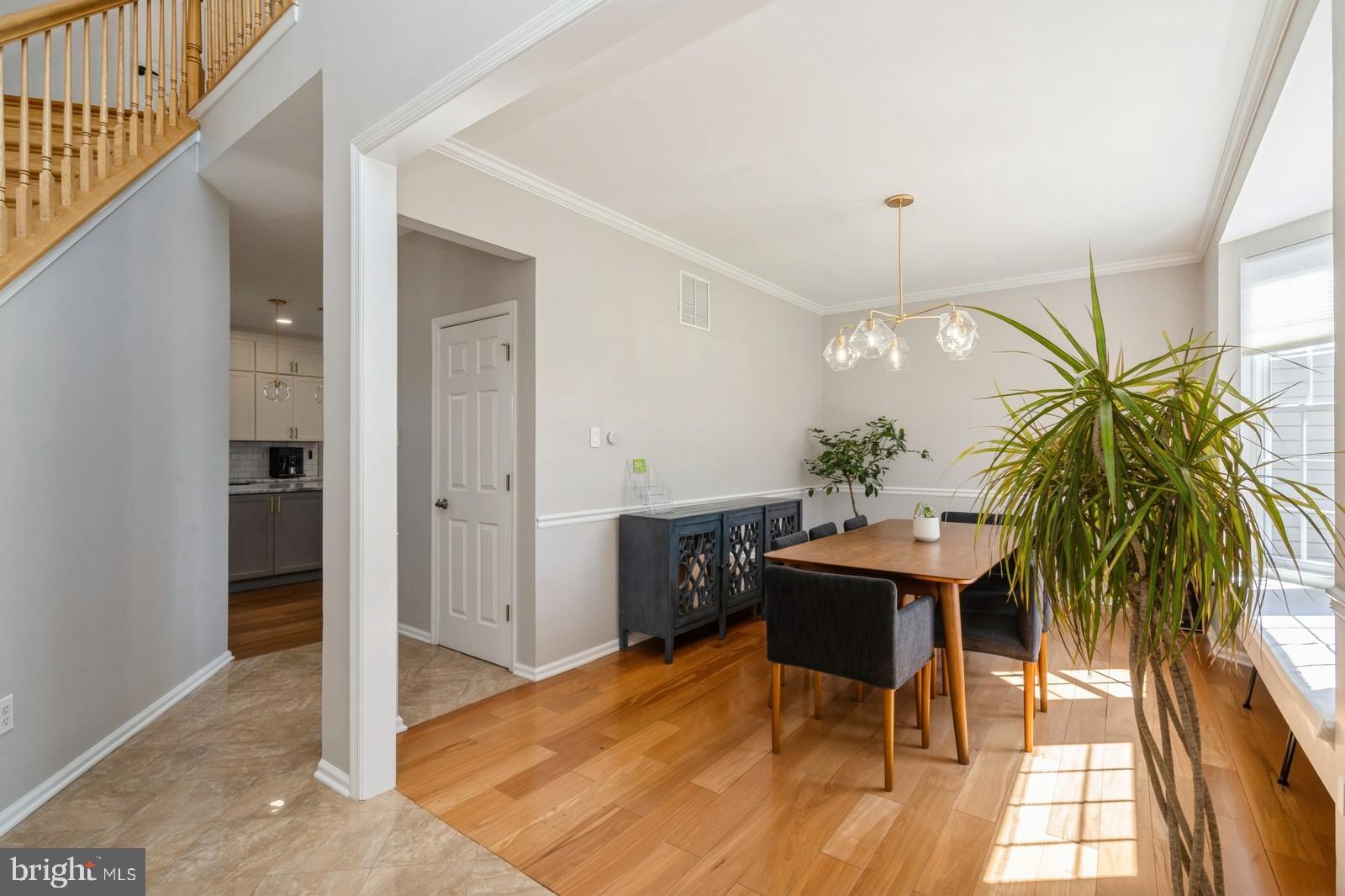 32 Moorsgate Circle Hightstown, NJ 08520 - Photo 8 of 49 a view of a dining room with furniture and a potted plant