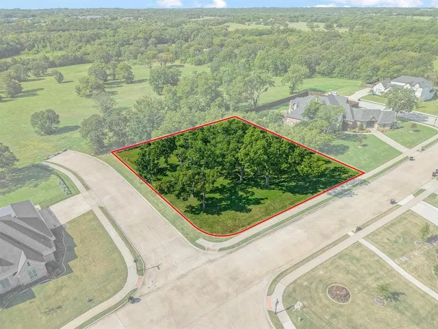 a view of a swimming pool with a yard