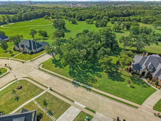 a view of a yard with an outdoor seating