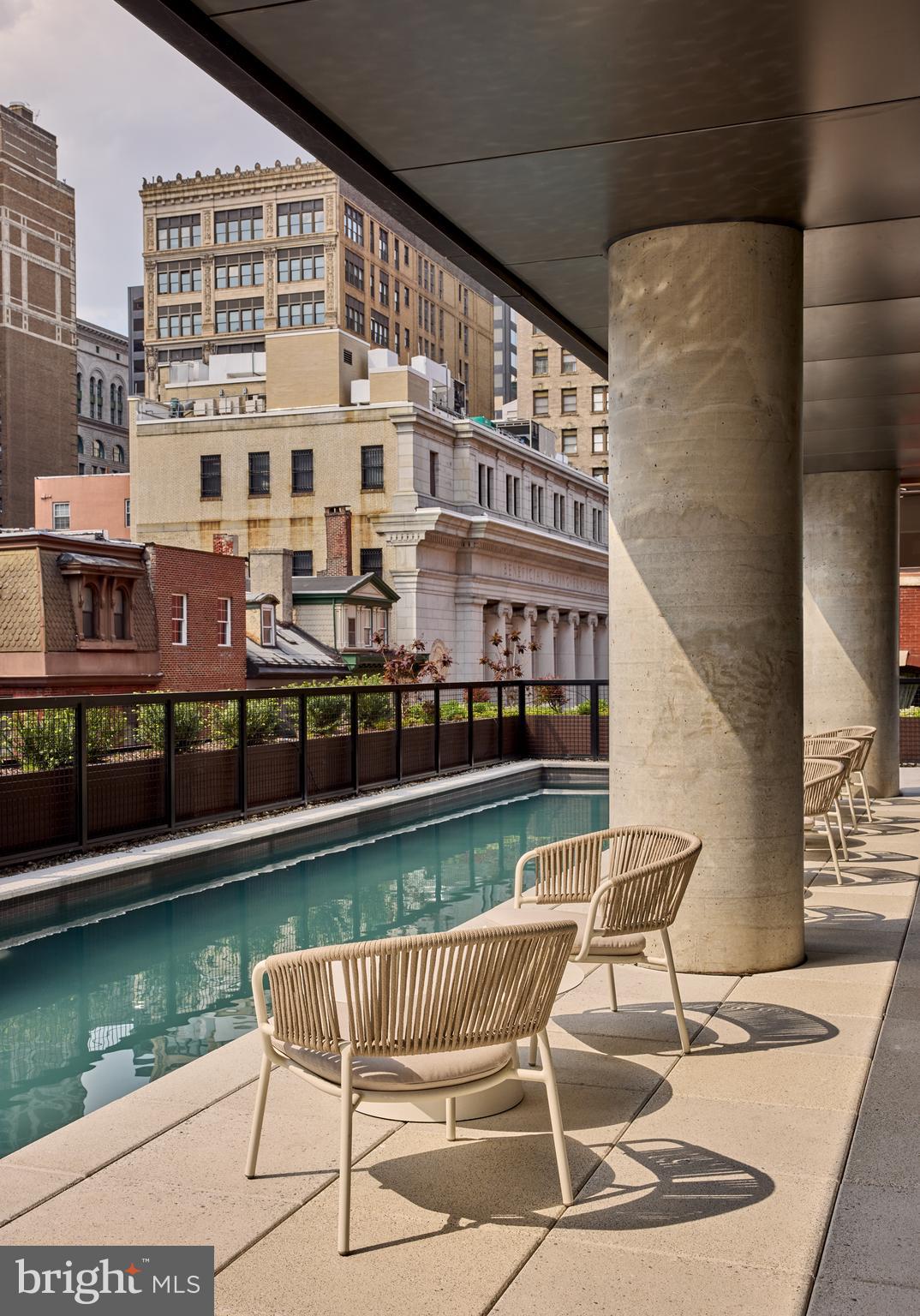 1134 Sansom Street, Unit 3BPH2001 Philadelphia, PA 19107 - Photo 25 of 33 a view of a chairs and table in the balcony