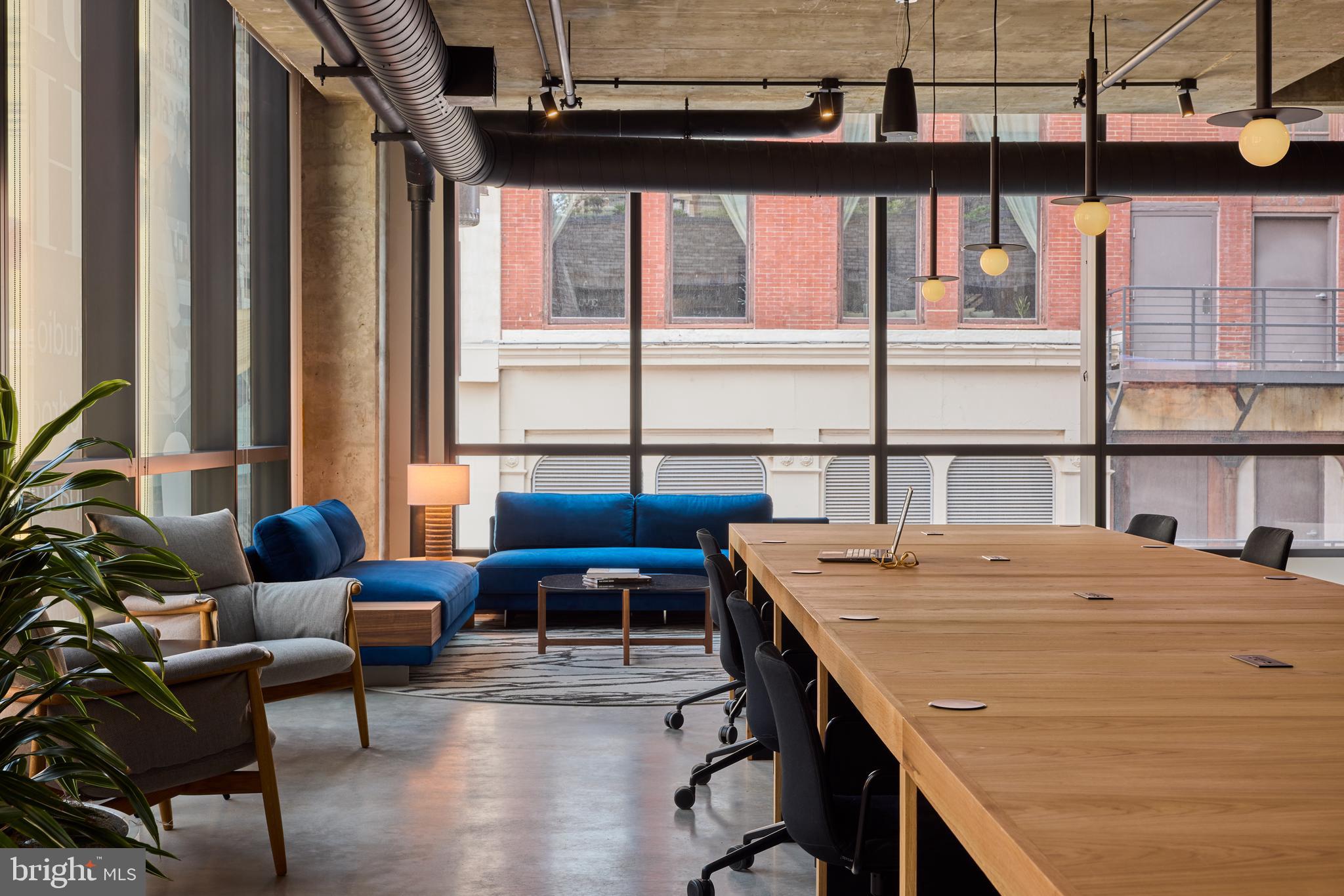 1134 Sansom Street, Unit 3BPH2001 Philadelphia, PA 19107 - Photo 3 of 33 a room with furniture and window