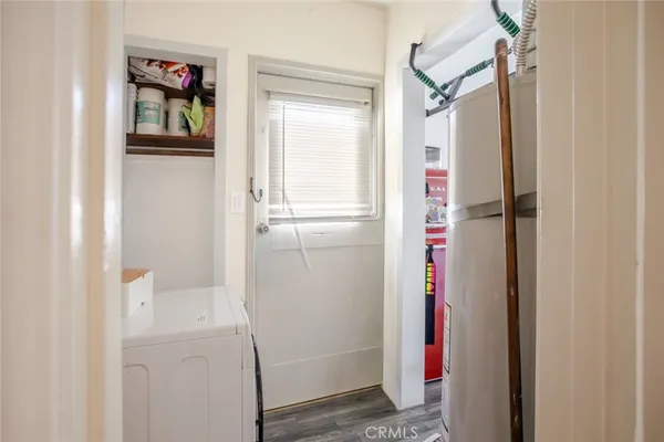 a bathroom with a shower and a sink
