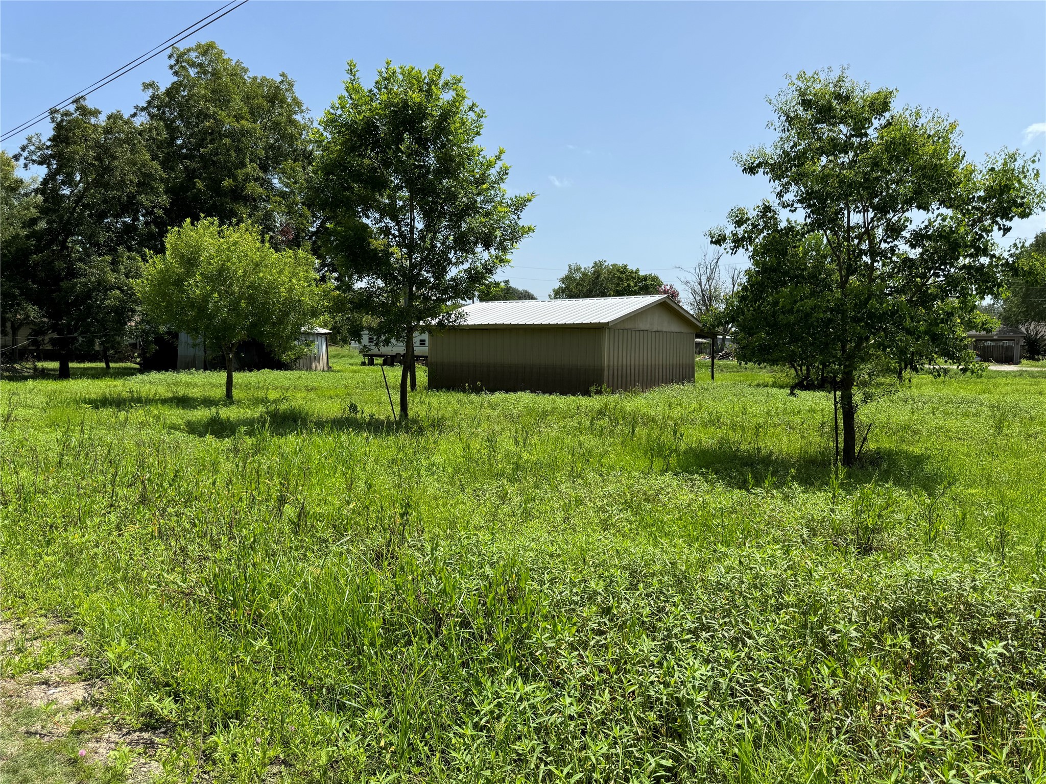Tbd White Oak Drive Trinity, TX 75862 - Photo 2 of 5 a view of backyard with outdoor seating and green space