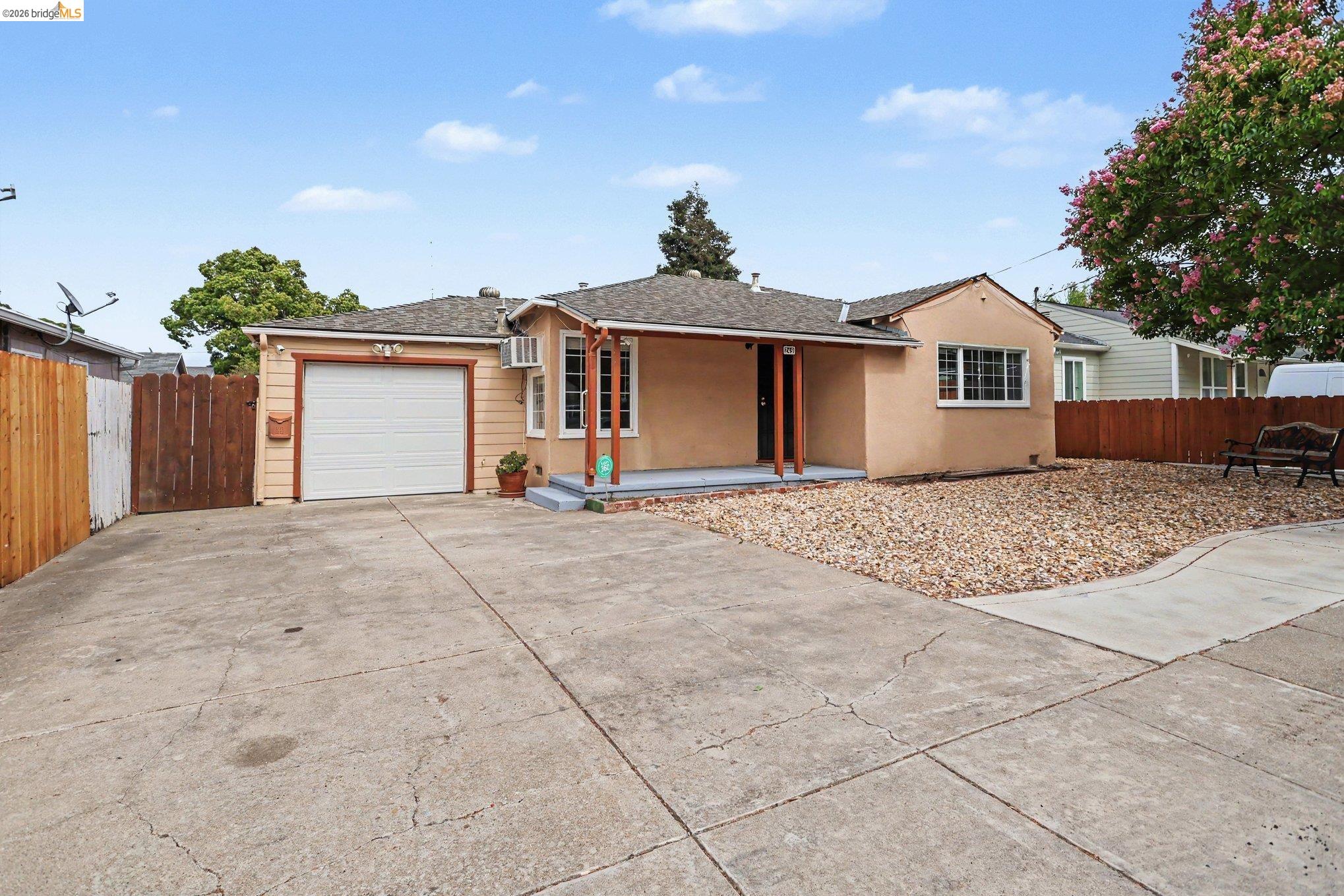 249 Madison Avenue Bay Point, CA 94565 - Photo 2 of 18 Single-story residence featuring a stucco exterior, attached single-car garage, and a concrete driveway