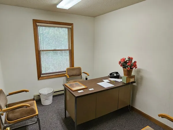 a room with furniture and window