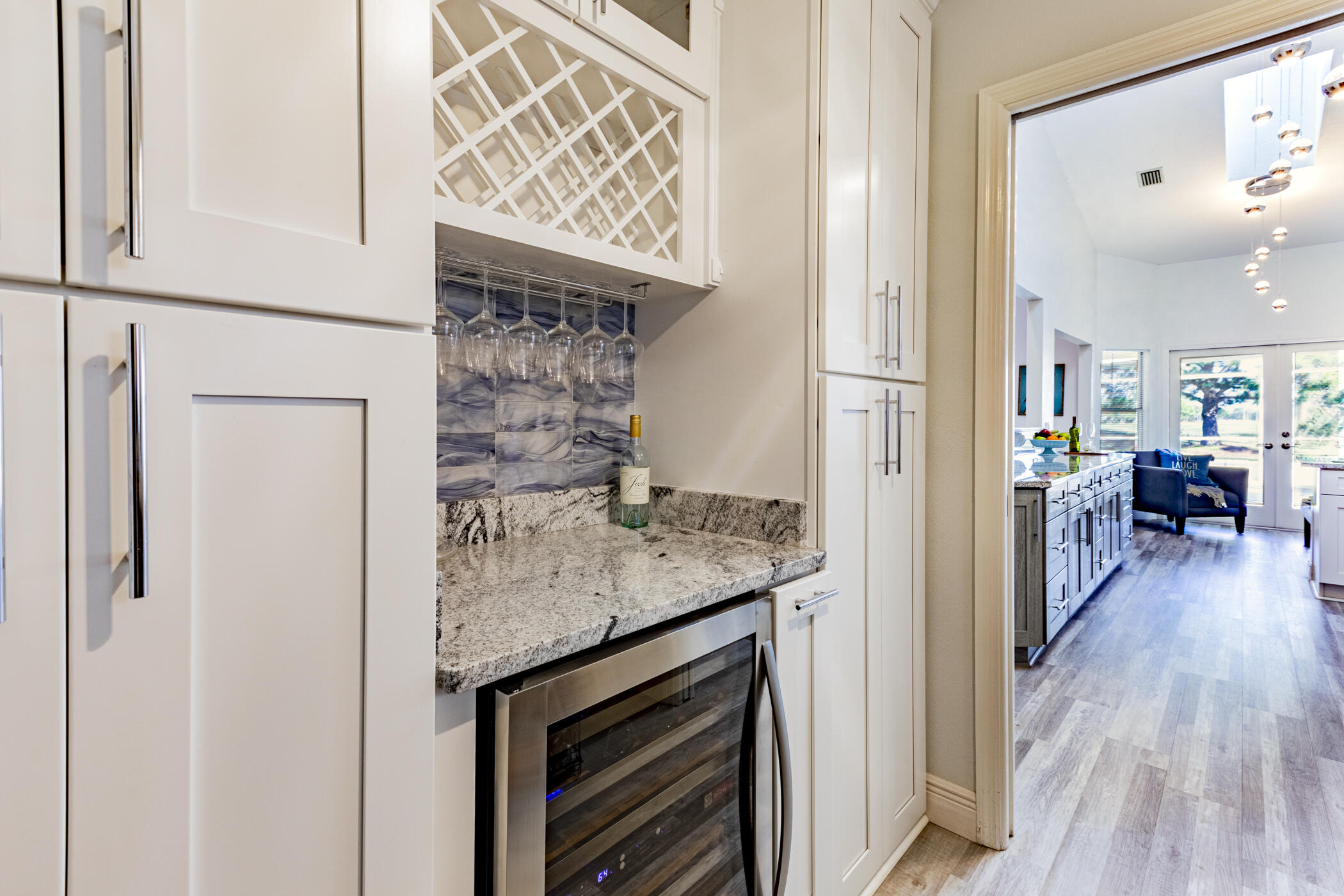 569 Dawson Drive Melbourne, FL 32940 - Photo 18 of 38 a view of living room with furniture and wooden floor
