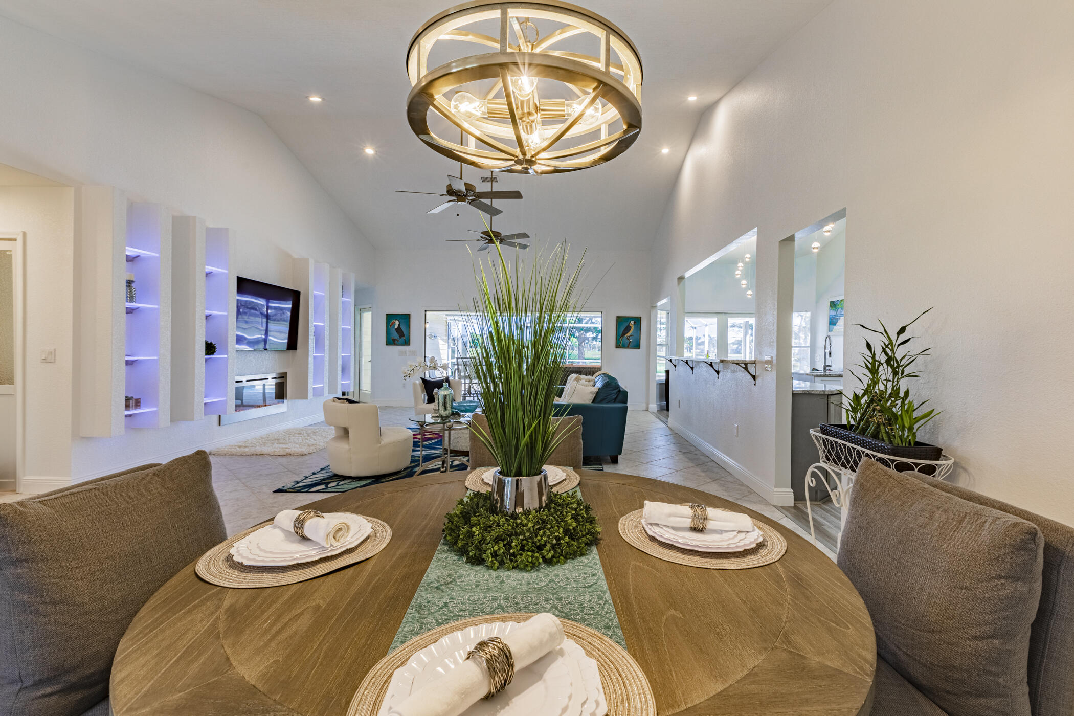 569 Dawson Drive Melbourne, FL 32940 - Photo 22 of 38 a living room with furniture and a large mirror