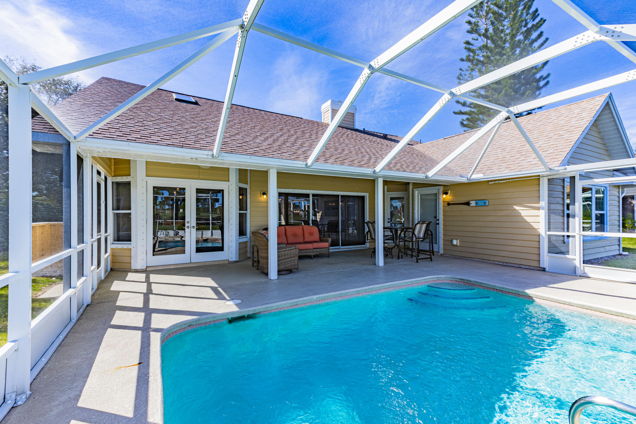 569 Dawson Drive Melbourne, FL 32940 - Photo 33 of 38 a view of an chairs and tables in the patio