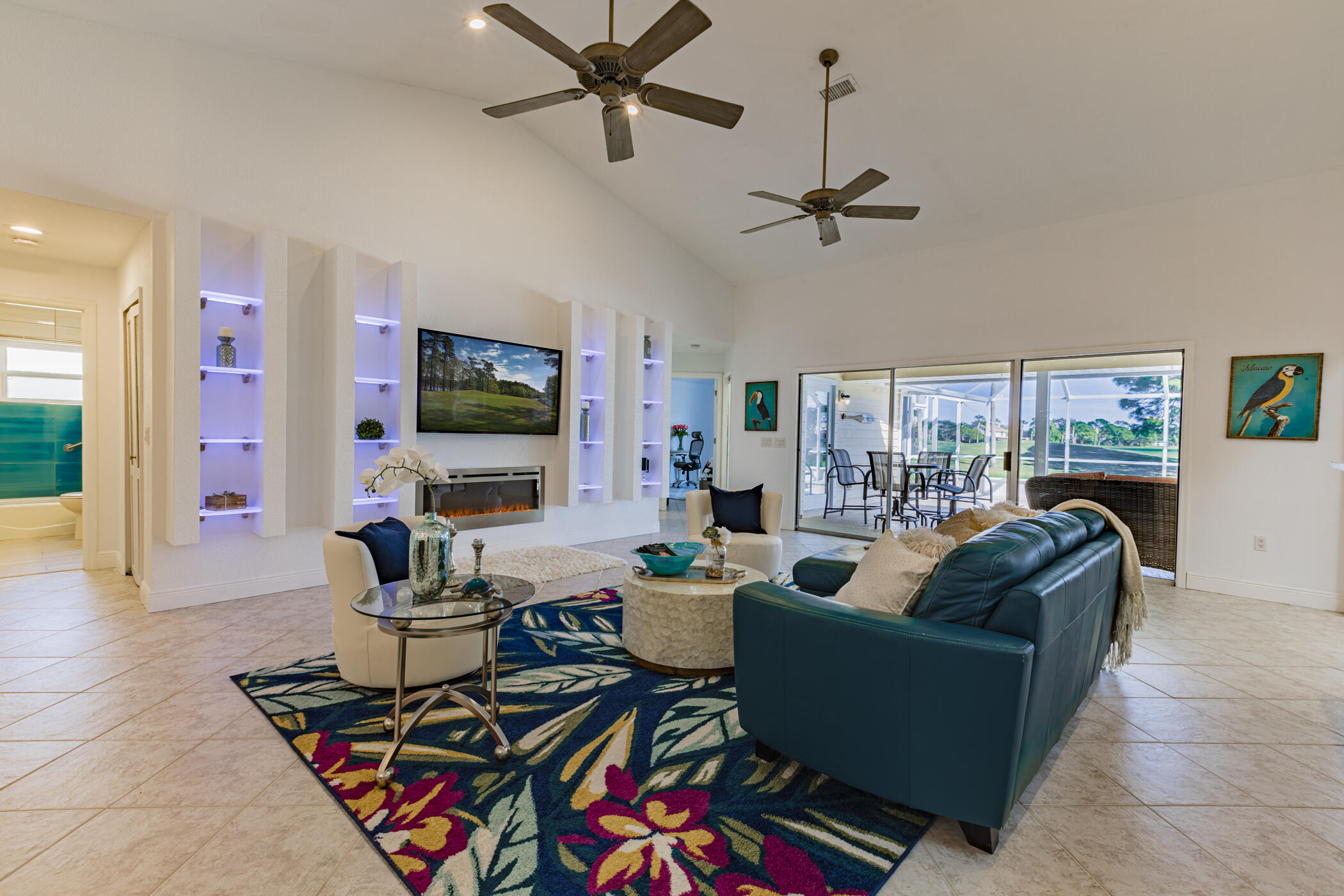 569 Dawson Drive Melbourne, FL 32940 - Photo 9 of 38 a living room with furniture and a flat screen tv