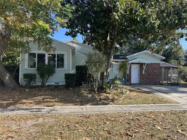 a view of backyard with sitting area and outdoor seating