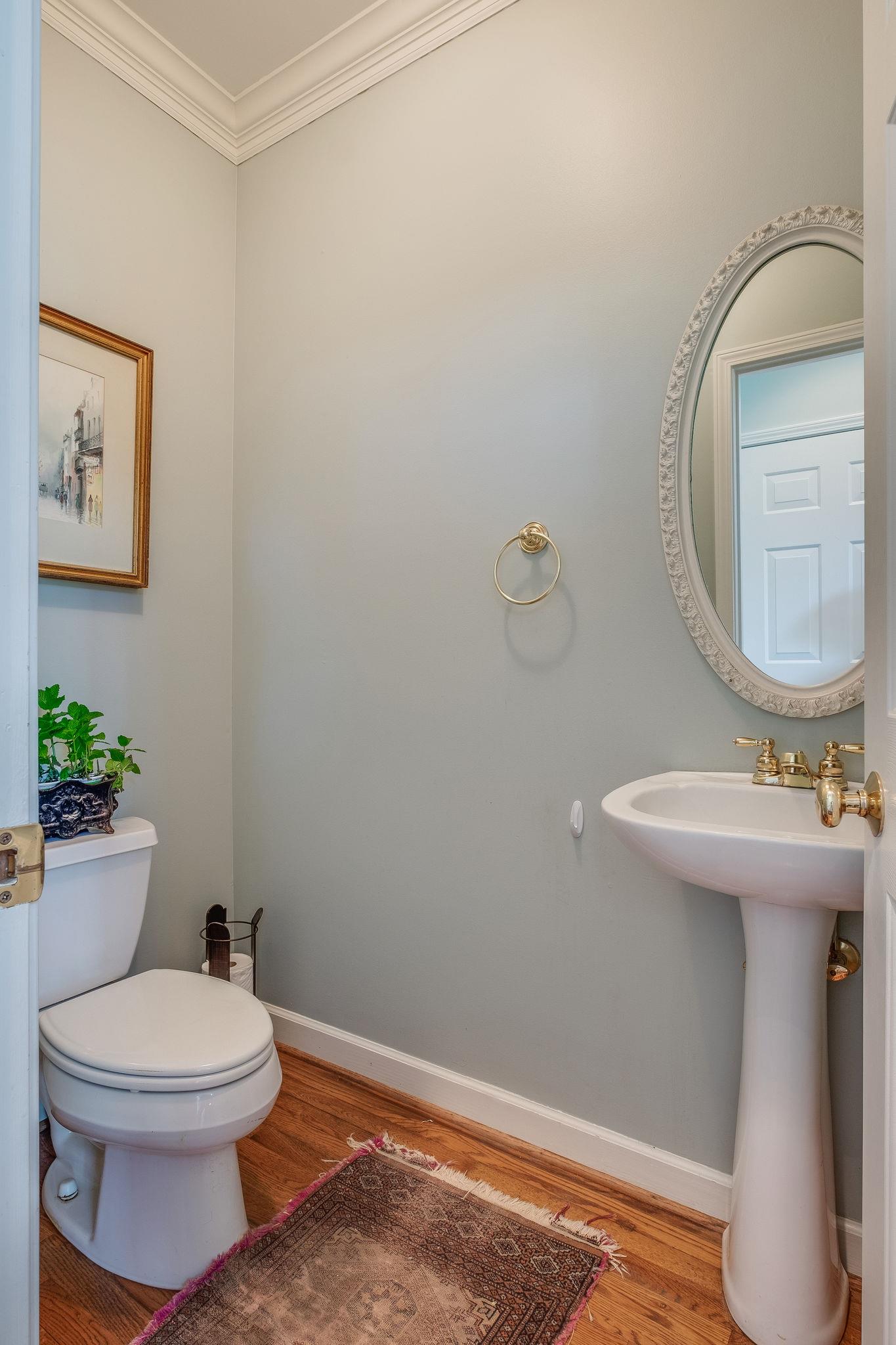 8224 Spring Ridge Drive Nashville, TN 37221 - Photo 16 of 25 The half bath is conveniently located in an ideal location on the main level