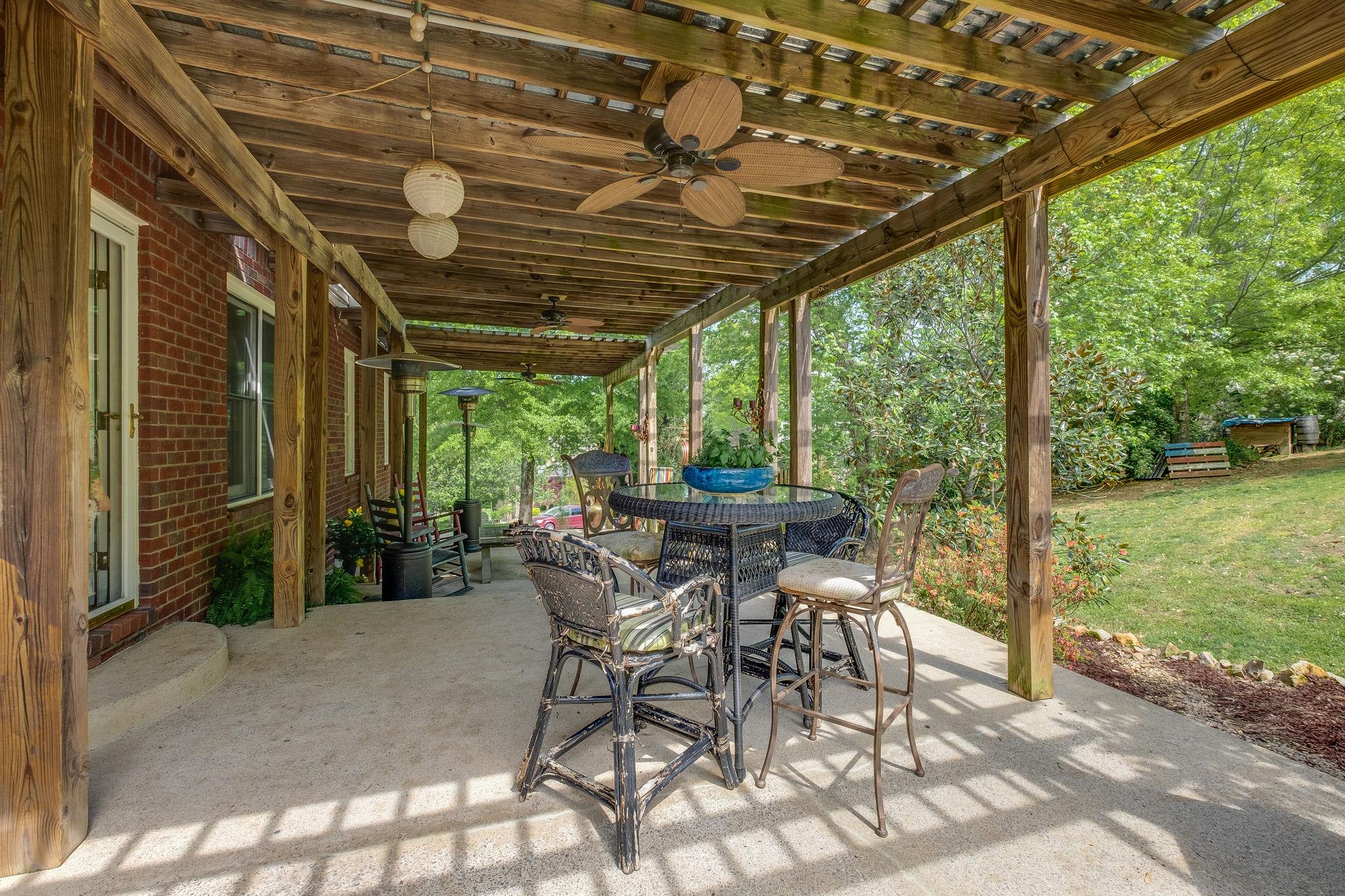 8224 Spring Ridge Drive Nashville, TN 37221 - Photo 23 of 25 Enjoy entertaining outdoors year round on this wonderful covered patio