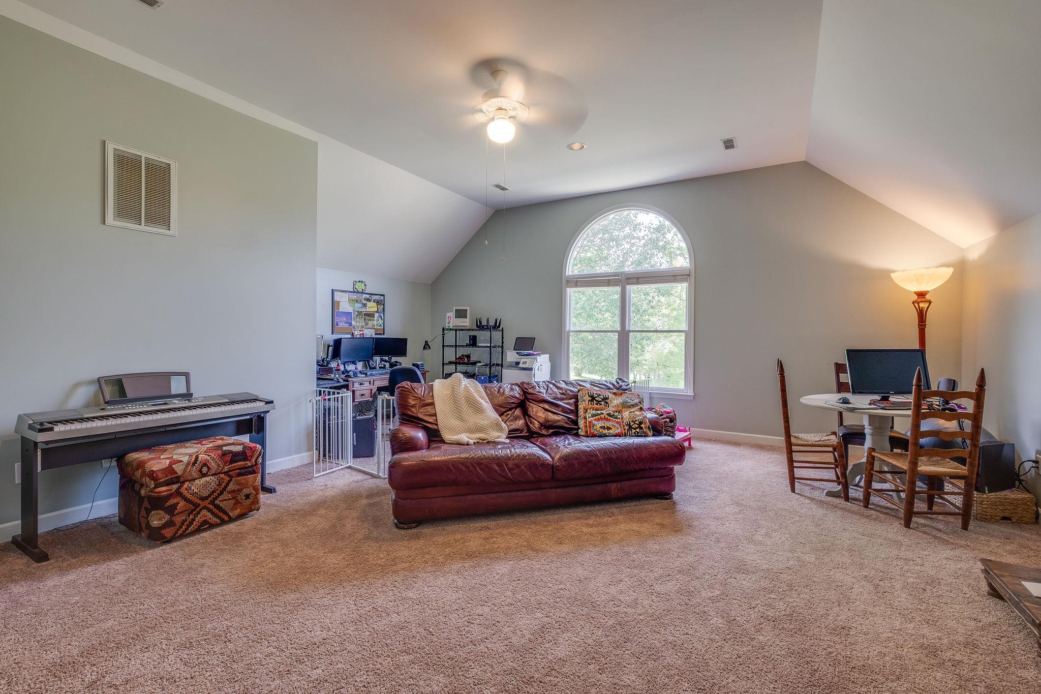 This bonus room will be a favorite place to relax and unwind.  BIG and comfy.