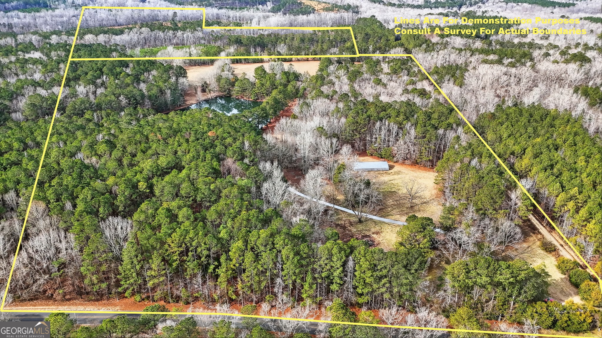 57.4-acres County Line Church Road Warm Springs, GA 31830 - Photo 22 of 35 a view of a lake with a city