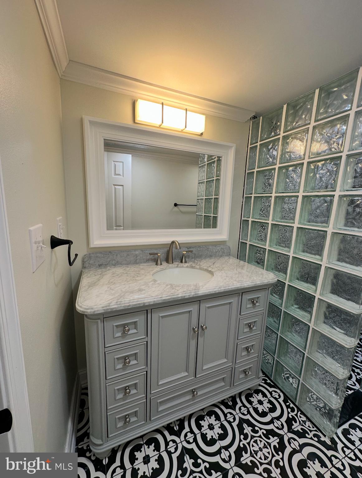 631 Hill Road Wernersville, PA 19565 - Photo 6 of 17 a bathroom with a granite countertop sink and a mirror