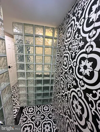 a view of a door and a window