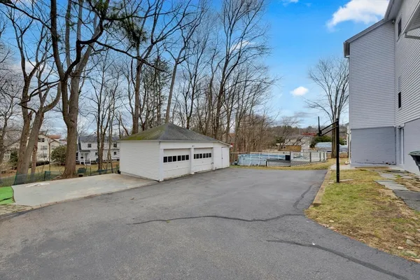 a view of a house with a snow in front of it
