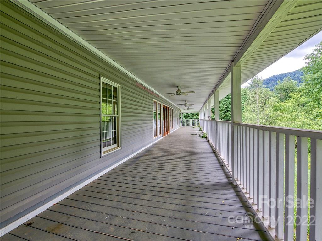 217 Durham Road Clyde, NC 28721 - Photo 5 of 24 a view of balcony with wooden floor