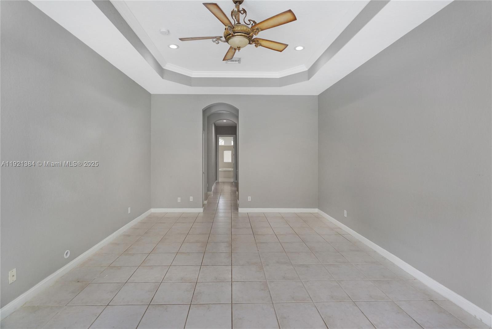 6713 Northwest 127th Terrace, Unit 1 Parkland, FL 33076 - Photo 9 of 15 a view of an empty room with a window