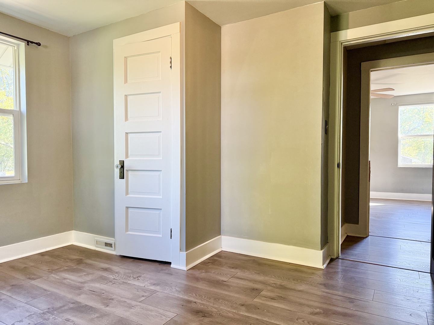 302 Highway 71 Newark, IL 60541 - Photo 14 of 19 an empty room with wooden floor and windows
