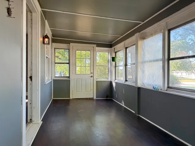 a view of entryway with wooden floor