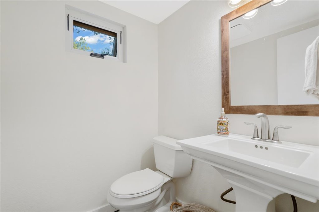 13126 Travis View Loop Austin, TX 78732 - Photo 10 of 27 Updated in 2020 Bathroom featuring toilet and baseboards