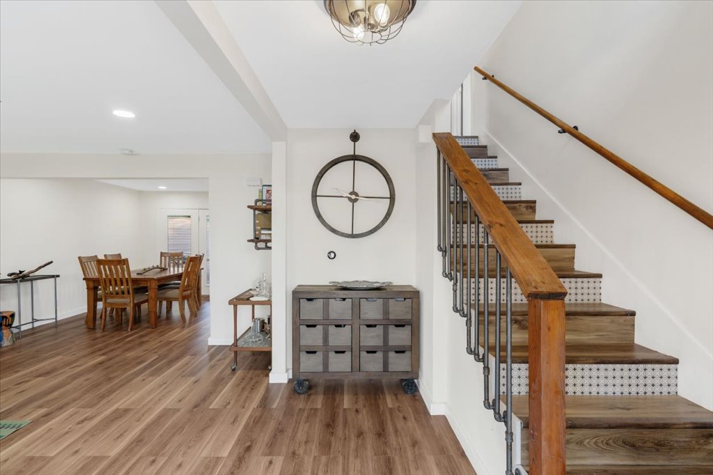 13126 Travis View Loop Austin, TX 78732 - Photo 3 of 27 Staircase with wood finished floors updated in 2020