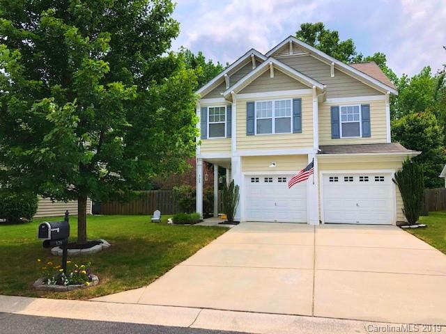 328 Sand Paver Way Fort Mill, SC 29708 - Photo 1 of 19 a front view of house with yard and green space
