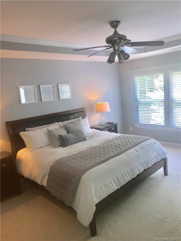 328 Sand Paver Way Fort Mill, SC 29708 - Photo 11 of 19 a bedroom with bed and window