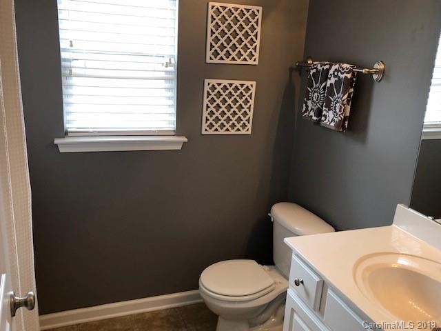 328 Sand Paver Way Fort Mill, SC 29708 - Photo 14 of 19 a white toilet sitting next to a bathroom sink