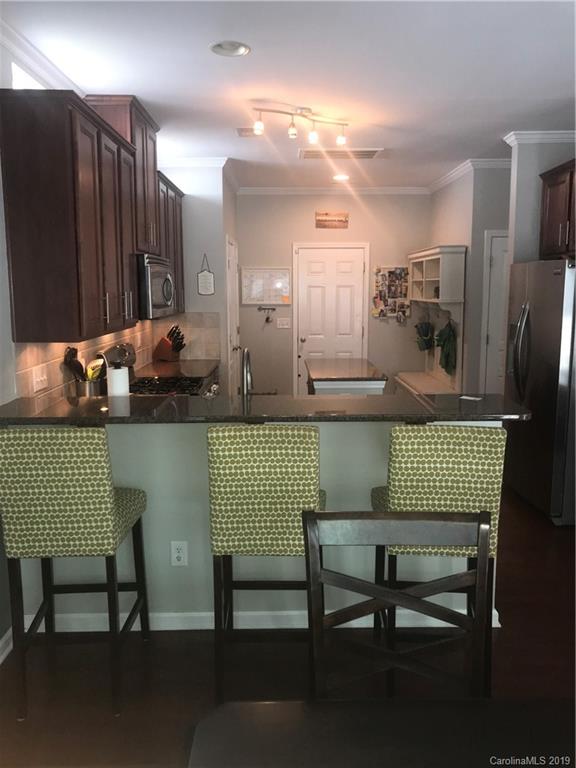 328 Sand Paver Way Fort Mill, SC 29708 - Photo 6 of 19 a open kitchen with a table chairs and a kitchen view