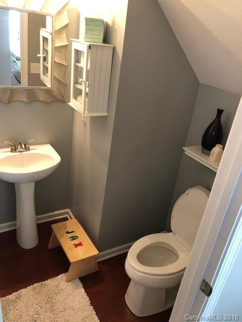 328 Sand Paver Way Fort Mill, SC 29708 - Photo 8 of 19 a white toilet sitting next to a bathroom sink