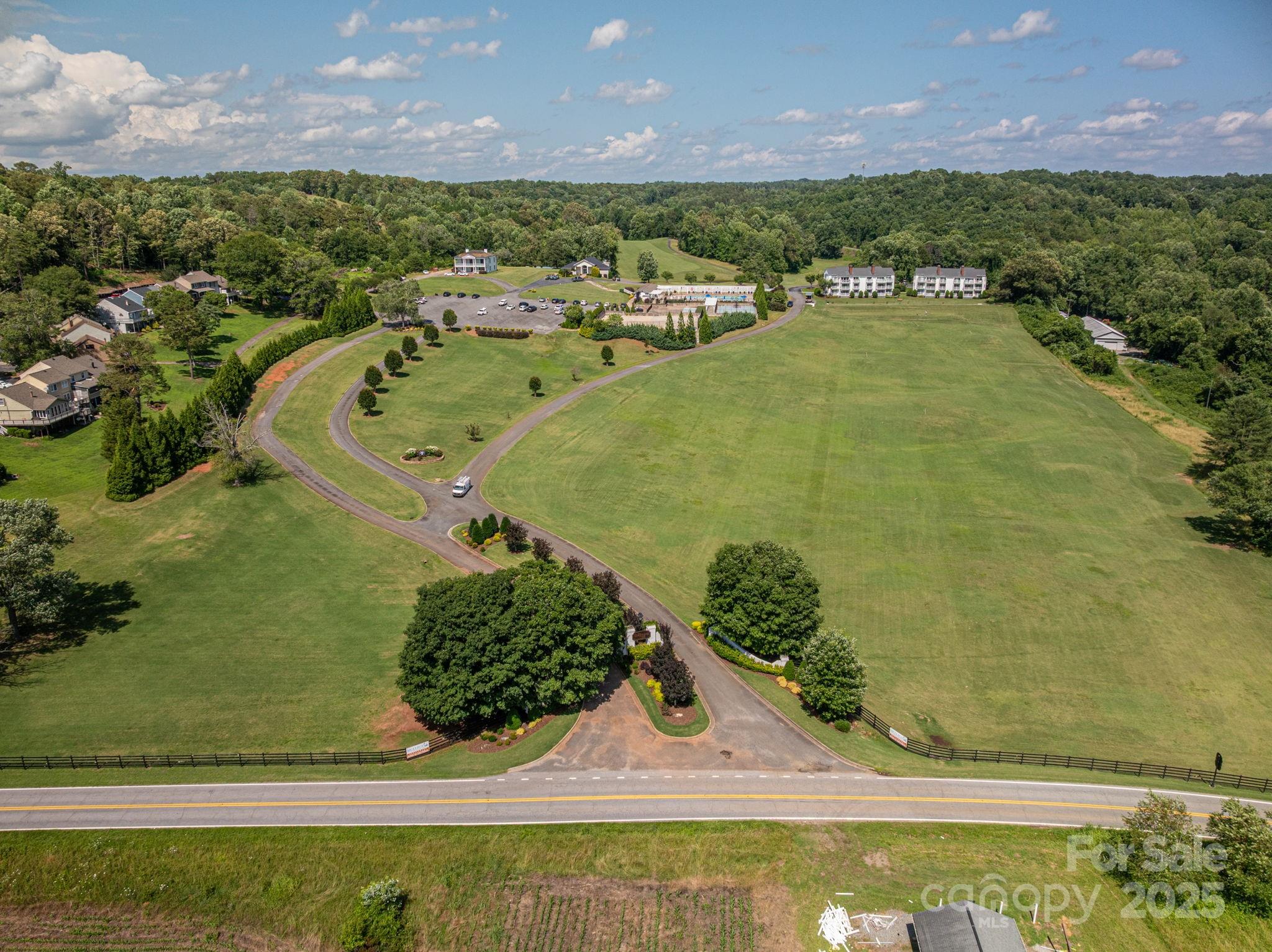 Lot 215 Plantation Drive Rutherfordton, NC 28139 - Photo 8 of 19 a view of a swimming pool with a yard