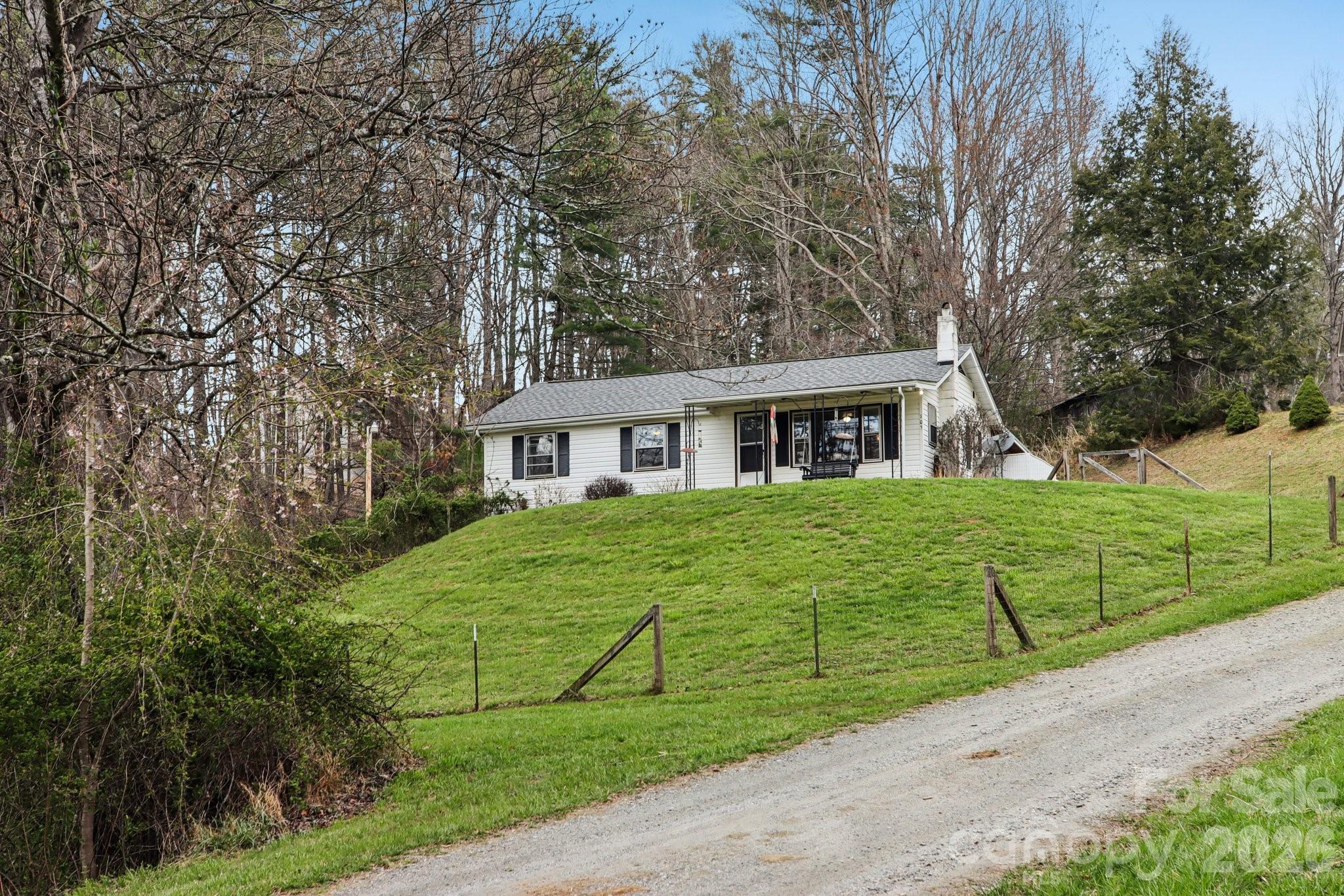 105 Baird Road Mars Hill, NC 28754 - Photo 11 of 48 a front view of house with yard and green space