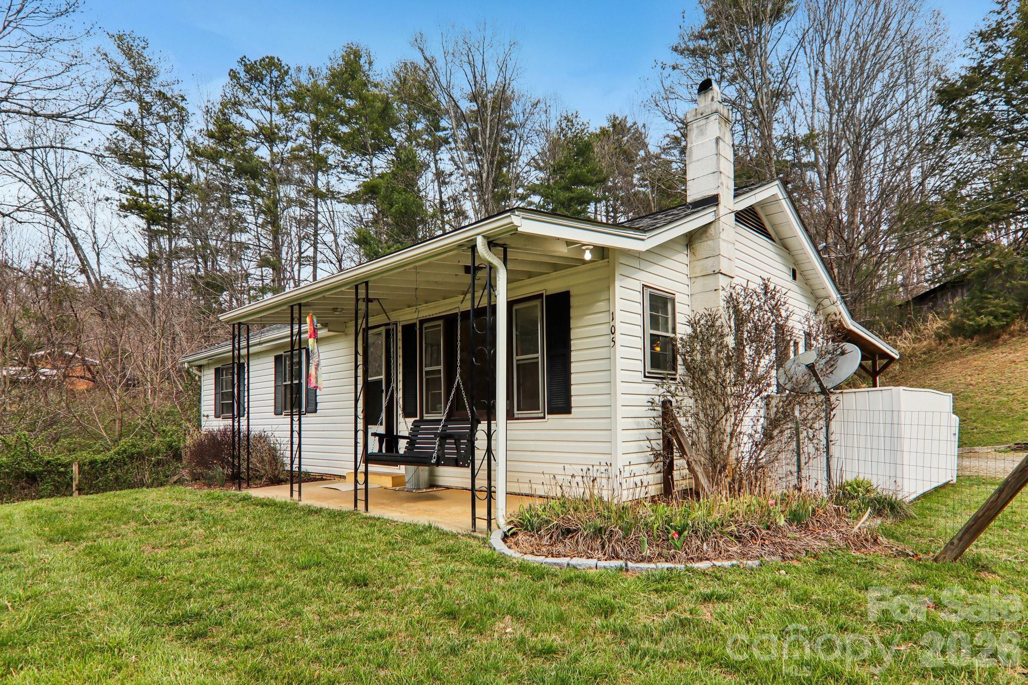 105 Baird Road Mars Hill, NC 28754 - Photo 13 of 48 a view of a house with a yard