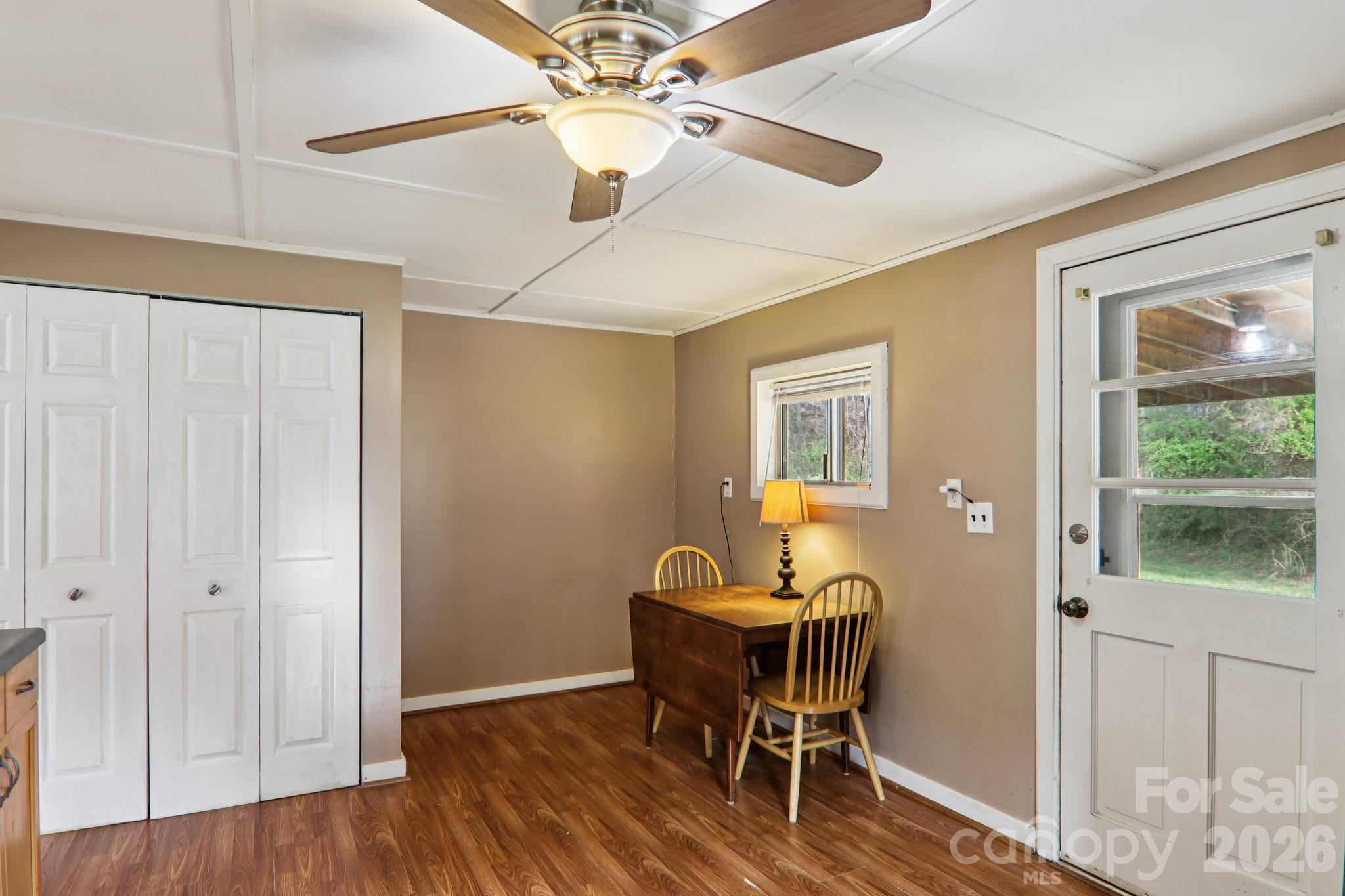 105 Baird Road Mars Hill, NC 28754 - Photo 21 of 48 a view of a workspace with furniture and a window