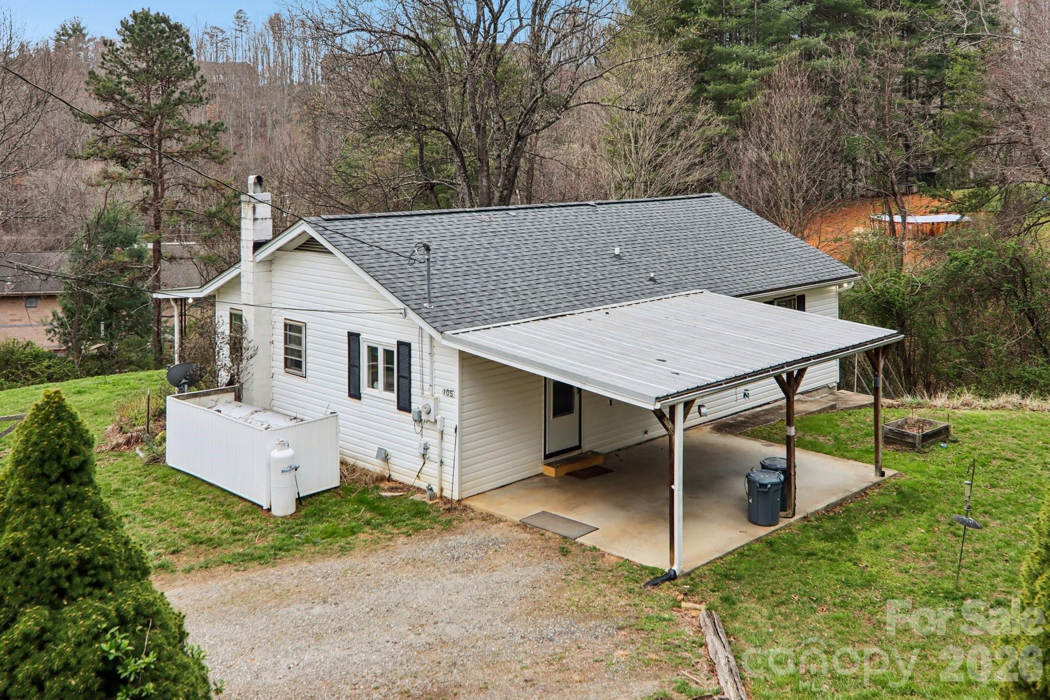 105 Baird Road Mars Hill, NC 28754 - Photo 3 of 48 a view of a patio in backyard