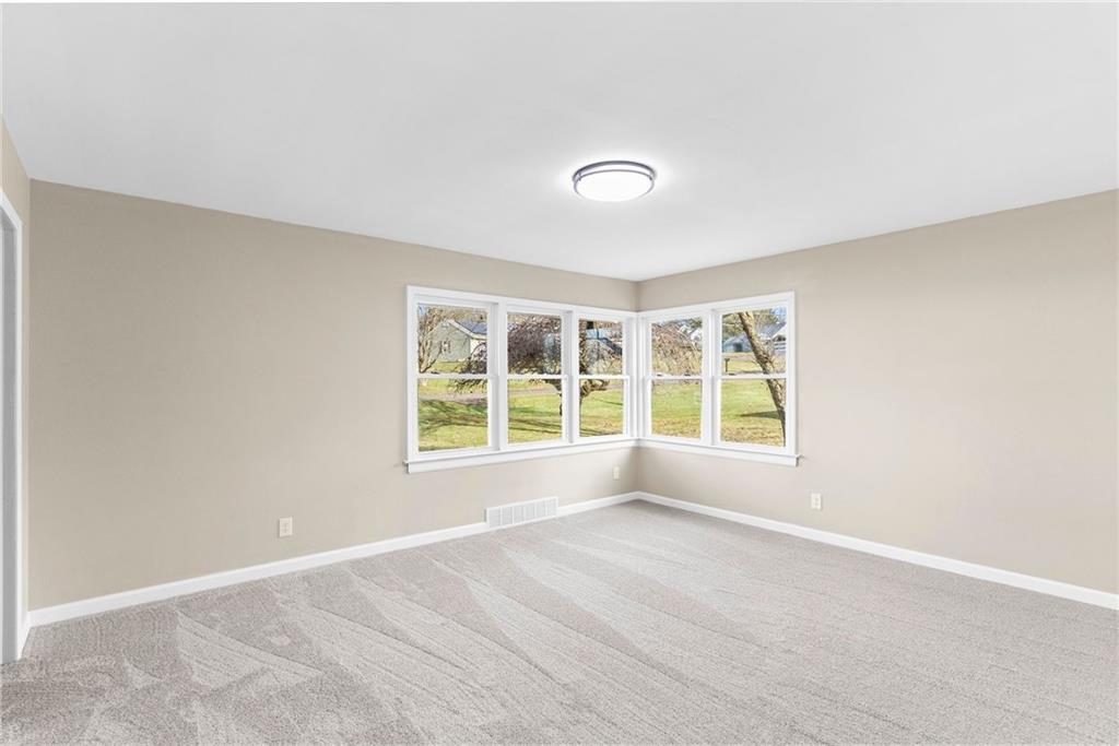 326 Frazier Drive New Castle, PA 16105 - Photo 15 of 29 Master Bedroom featuring unique corner windows drawing in the natural light.