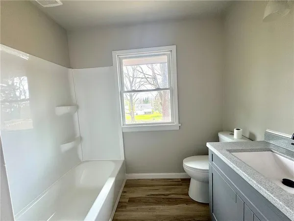 a bathroom with a sink and a bathtub