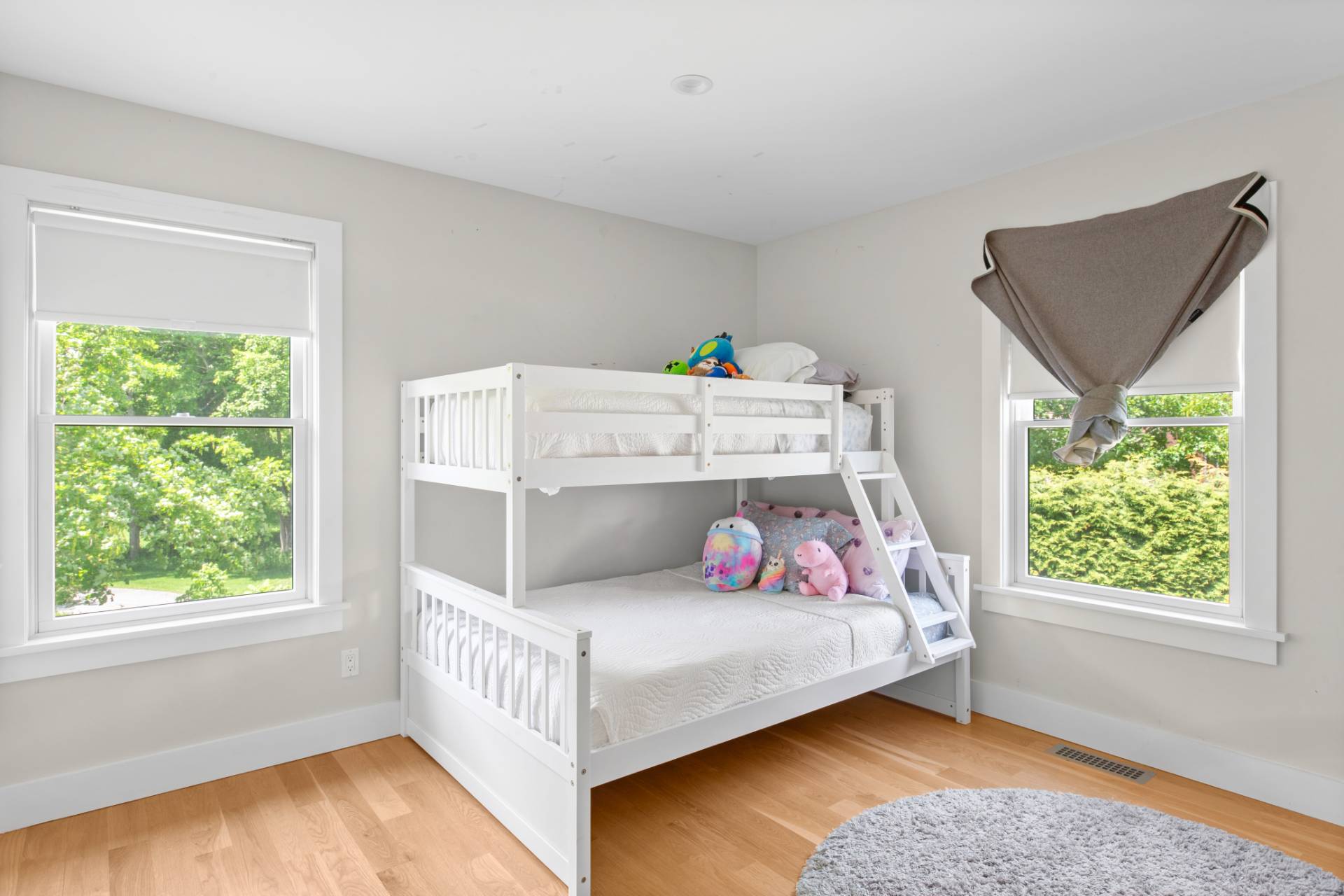 87 Accabonac Road East Hampton, NY 11937 - Photo 12 of 21 a bedroom with a bed and window