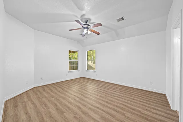a bathroom with a bathtub and a sink
